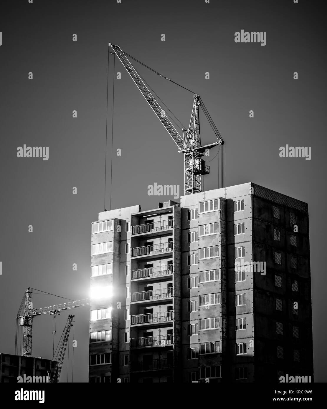 Construction site scaffolding cranes Black and White Stock Photos ...