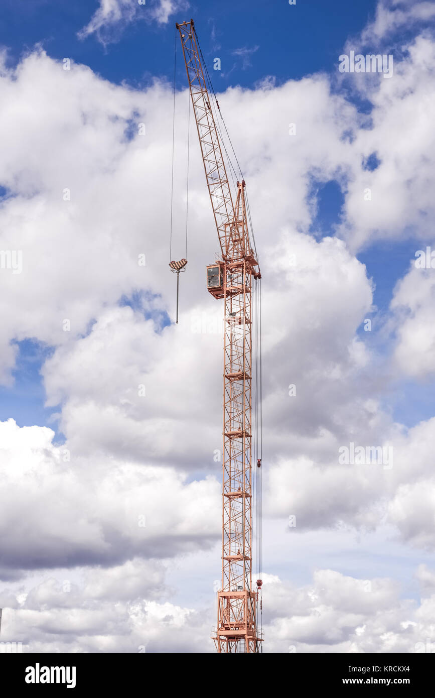 building crane on Cloudy sky background Stock Photo