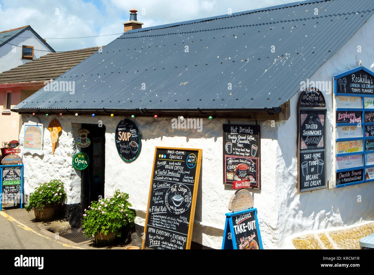 Colourful menu blackboard menu notice boards on a quaint cafe at Coverack, Cornwall, UK Stock Photo