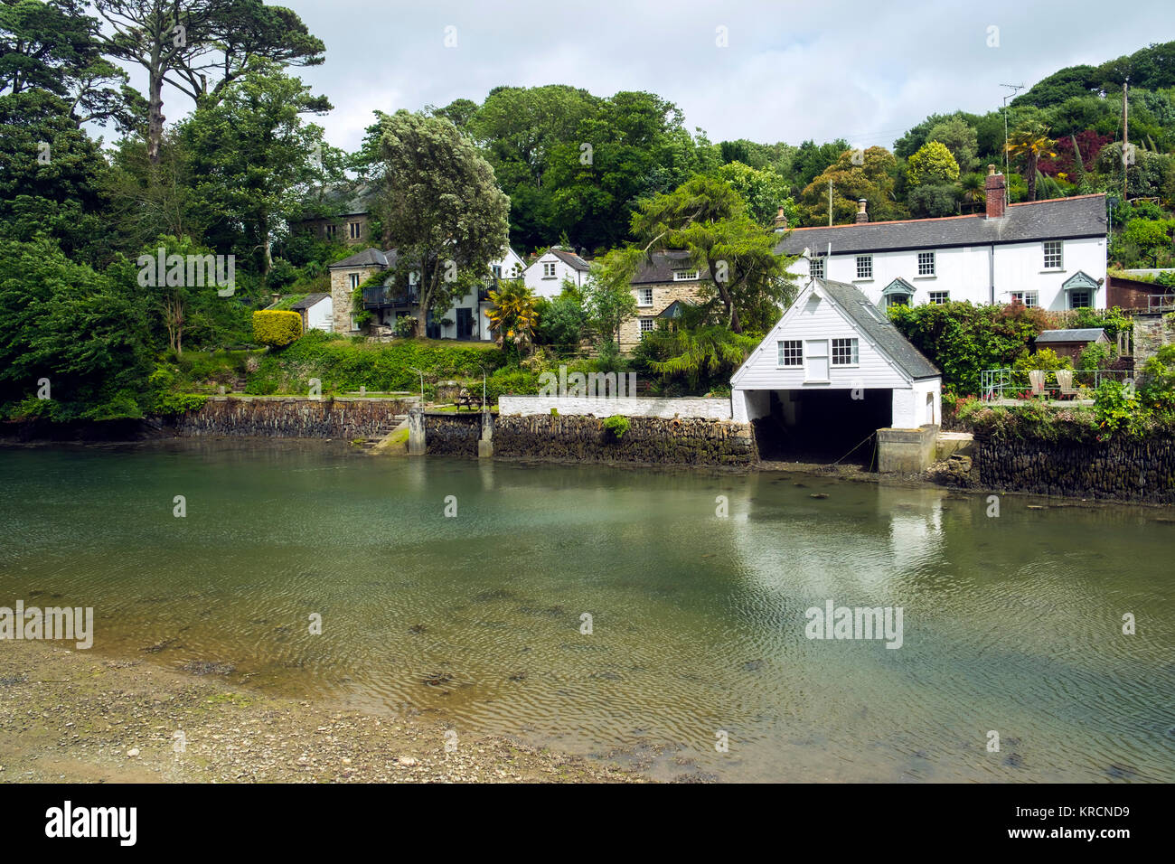 Idyllic homes alongside the waters edge in Helford village on the