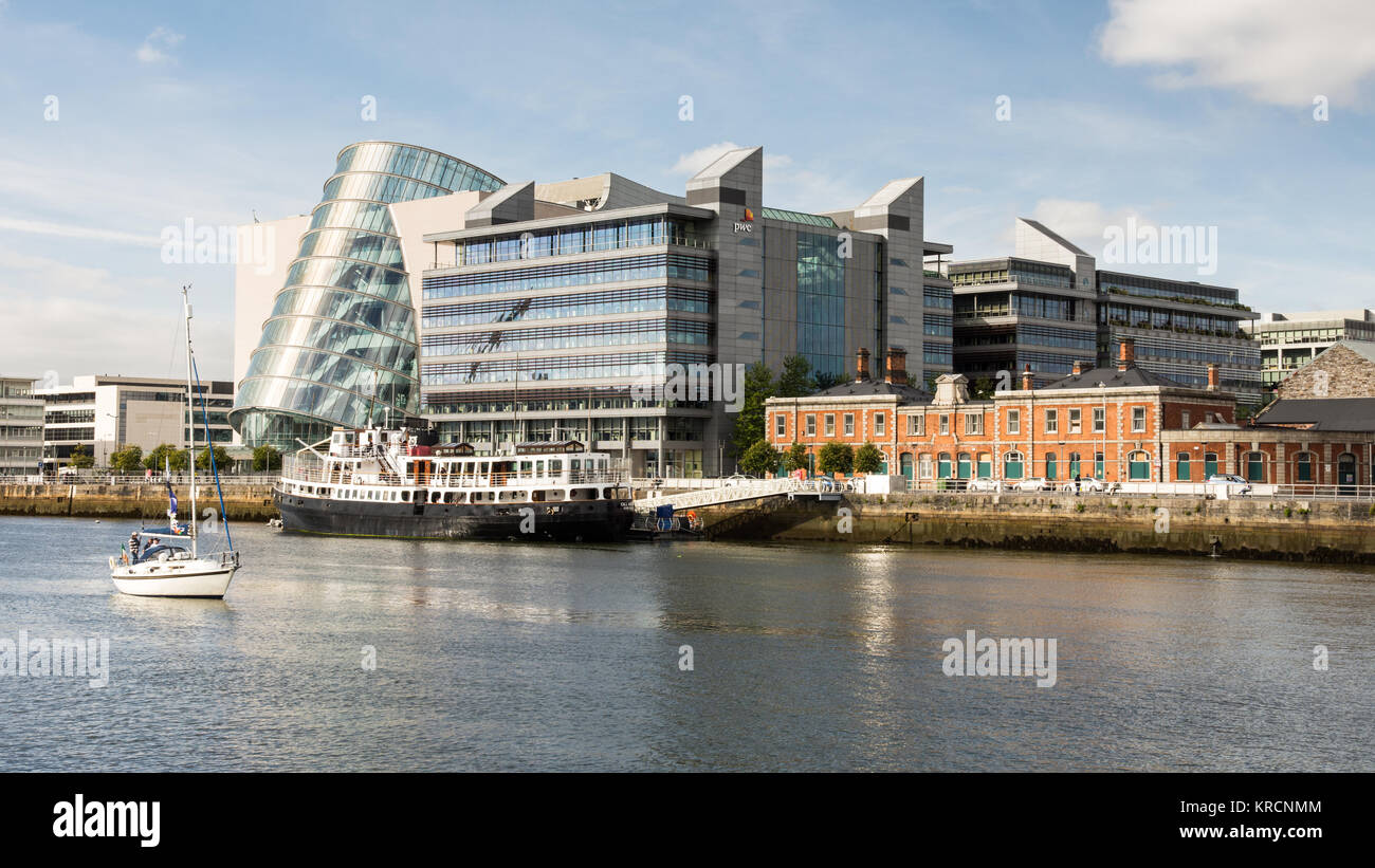 Dublin, Ireland - September 17, 2016: Convention Centre Dublin and the MV Cill Airne ship on the River Liffey in Dublin's regenerating docklands distr Stock Photo