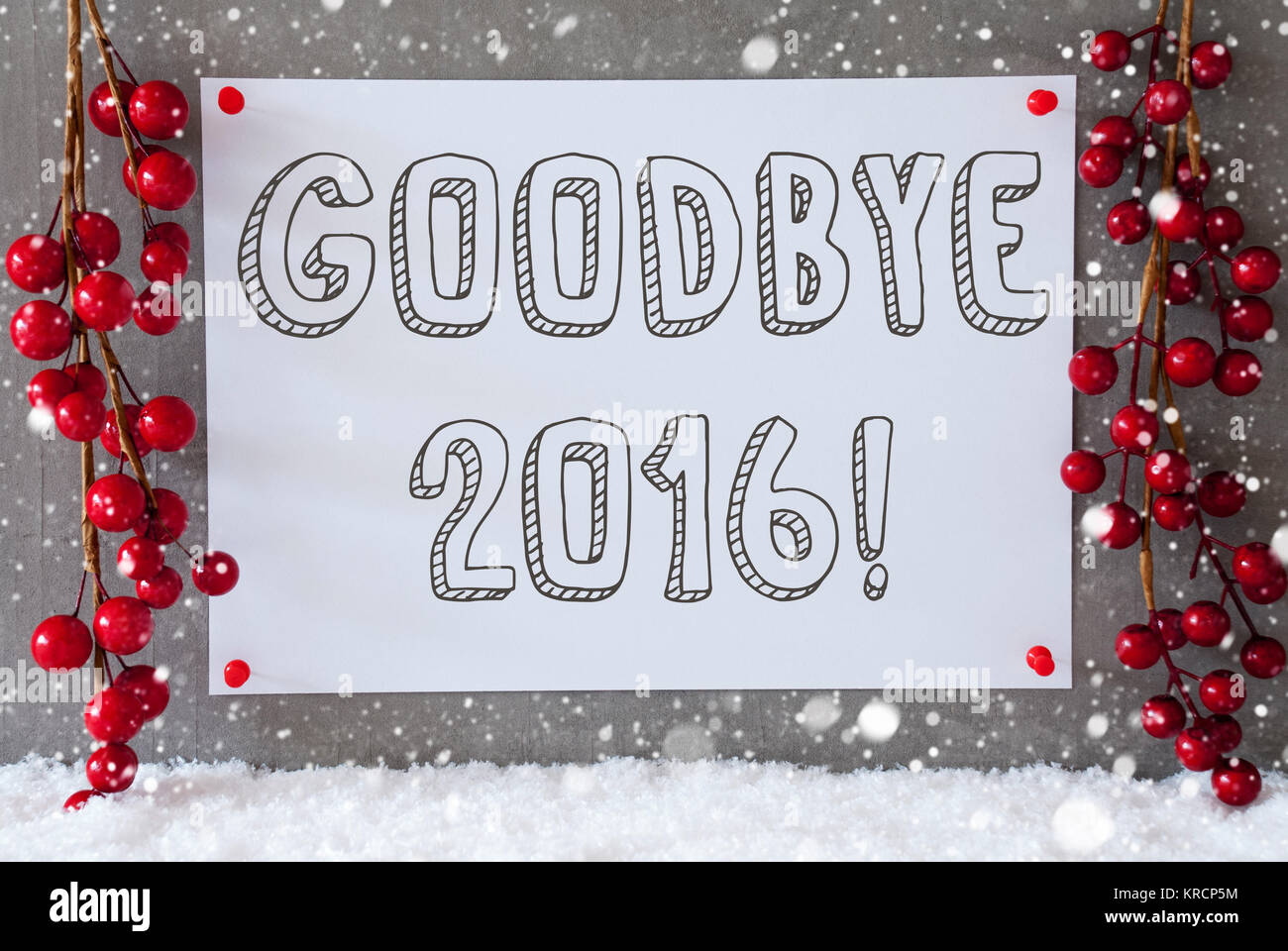 Label With English Text Goodbye 2016 For Happy New Year. Red Christmas Decoration On Snow. Urban And Modern Cement Wall As Background With Snowflakes. Stock Photo