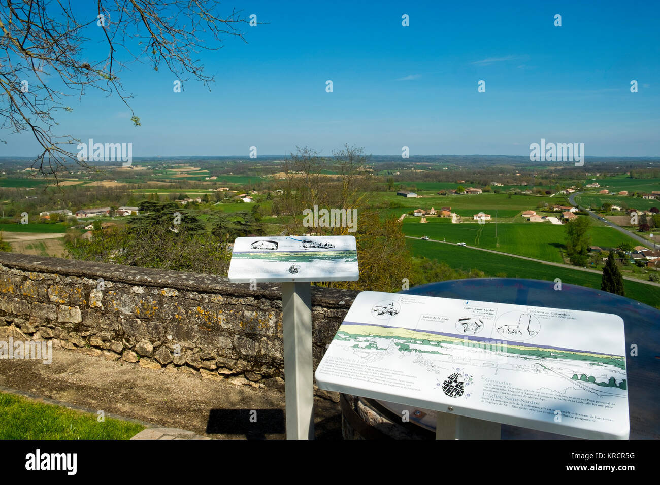 Notice boards describe features of the far-reaching views across open countryside from hilltop Monflanquin, Lot-et-Garonne, France. This picturesque community is thought to be one the most historically intact examples of a medieval bastide town. Stock Photo