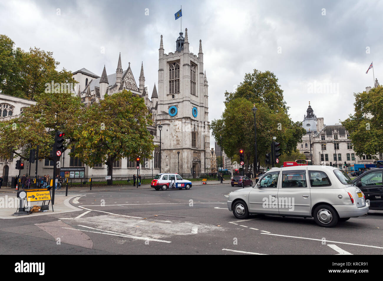 London, United Kingdom - October 29, 2017: Taxi cabs go on the street in London city Stock Photo