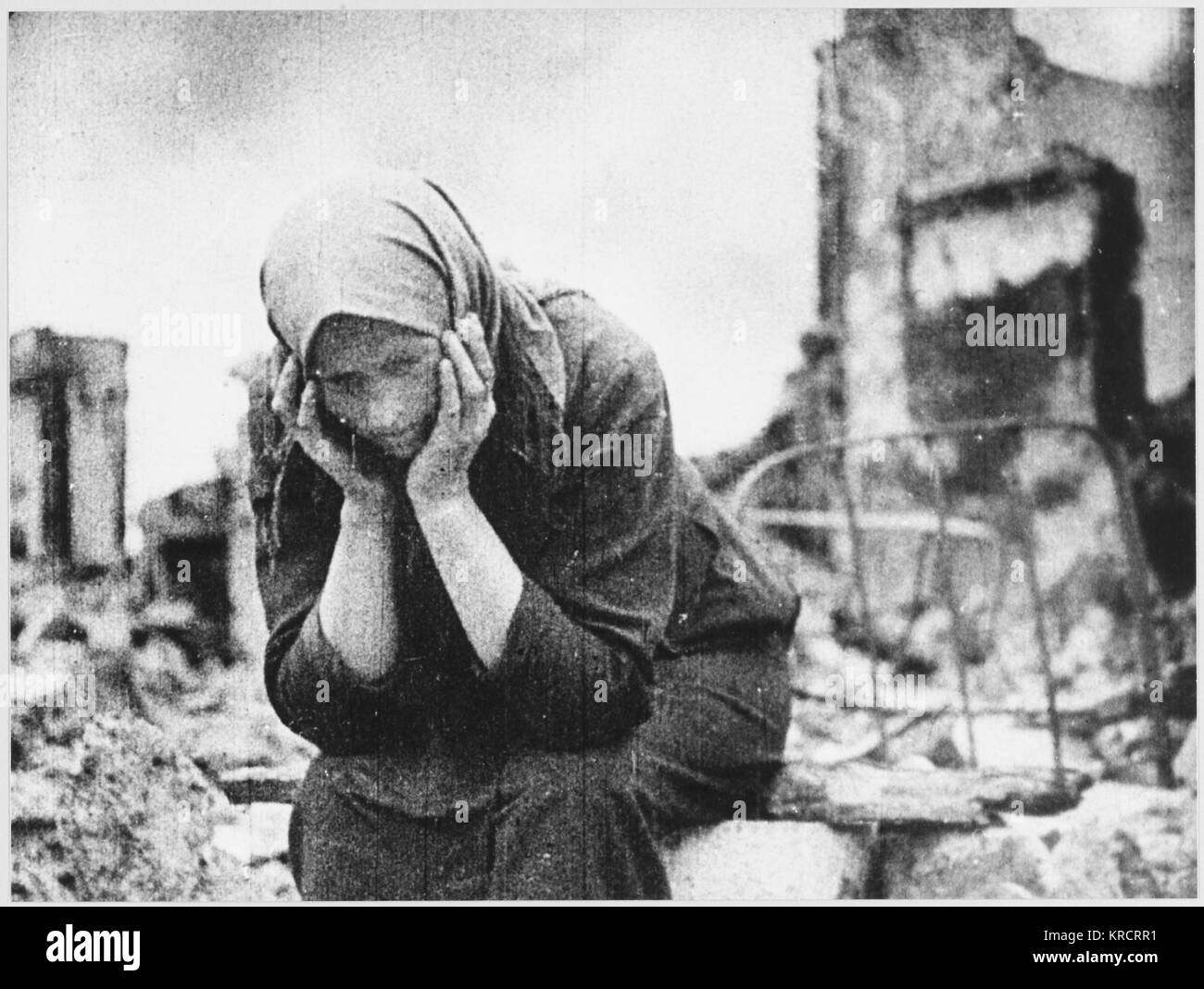 CIVILIAN AMONG RUINS Stock Photo