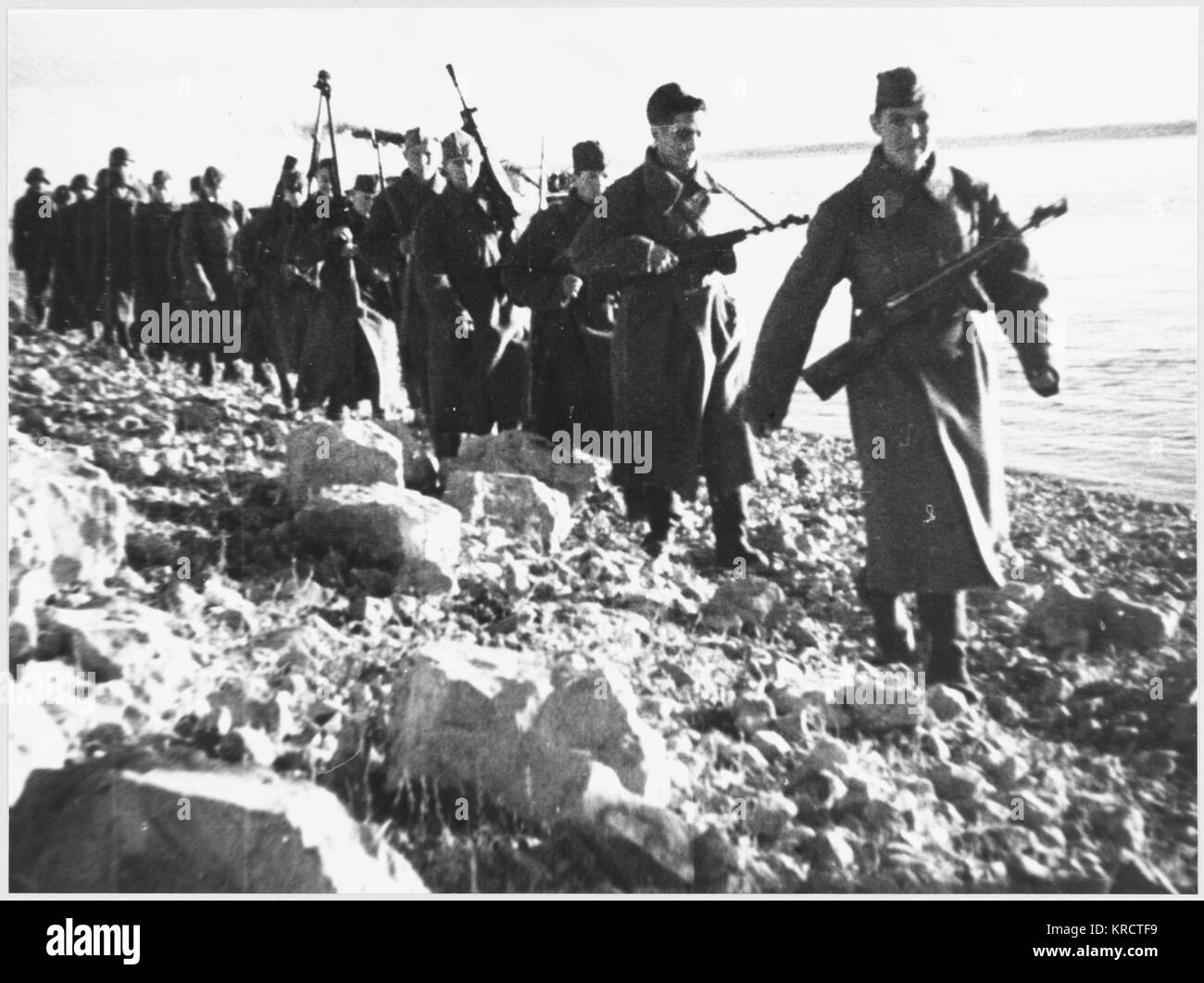 Re-inforcements arrive having crossed the Volga River. Date: 1942-43 Stock Photo