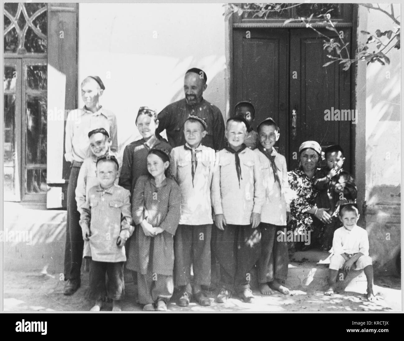 12 ORPHANS ADOPTED Stock Photo