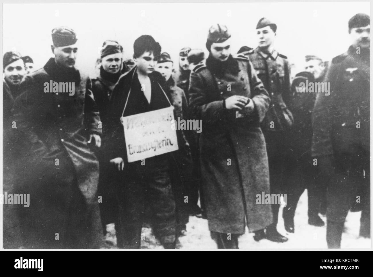 Zoia Kosmodemianskaya, accused of collaboration with the Nazi occupying forces, is tried and condemned by a court of locals and partisans, and taken to be hanged (photo 1 of 2) Date: 1941 Stock Photo