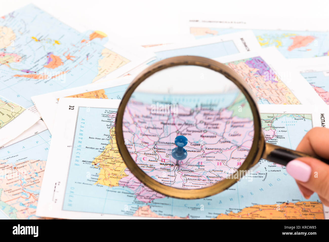 magnifying glass on a map closeup Stock Photo Alamy