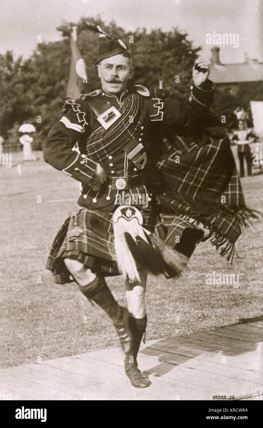 A kilted Scot performs the HIGHLAND FLING Date: early 20th century Stock Photo