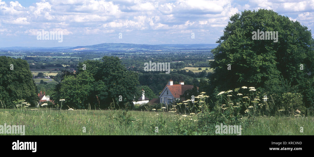 Worcestershire scenery,  England : View looking  eastwards across the Vale of  Severn to Bredon Hill, from  the Malvern Hills.      Date: 2004 Stock Photo