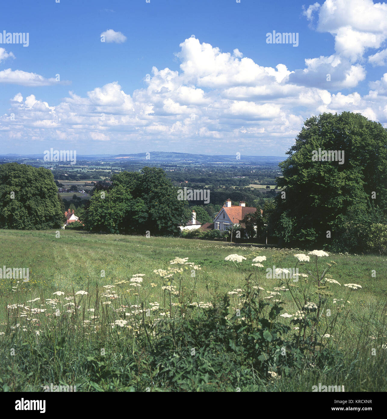 The Vale of Severn, looking  eastwards towards Bredon Hill  from below the Malverns,  Worcestershire, England.       Date: 2004 Stock Photo