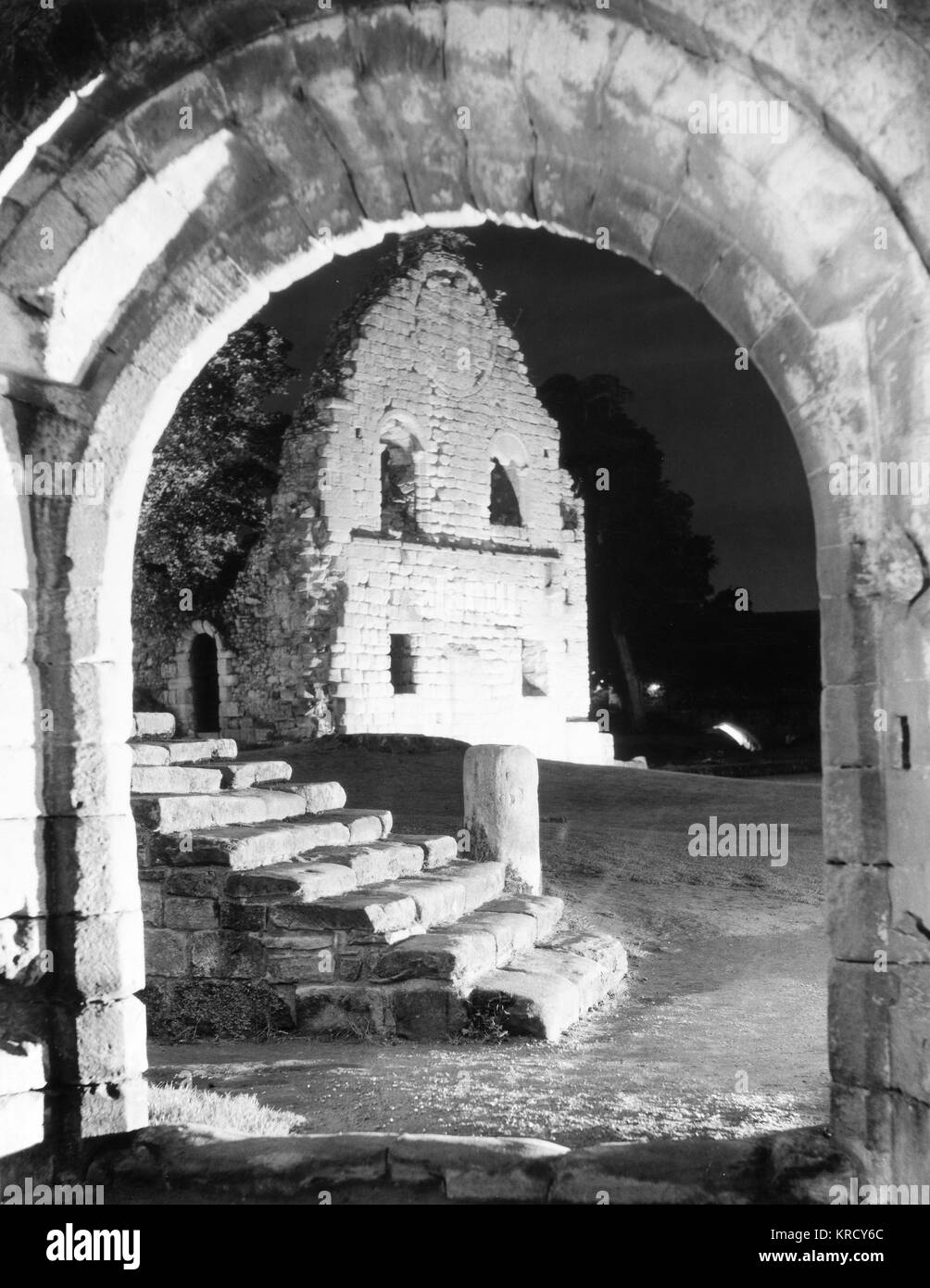 Night study of the floodlit Guest House and Monks' Day Stairs of f Fountains Abbey, Yorkshire, England, a Cistercian abbey, founded in 1132. Stock Photo
