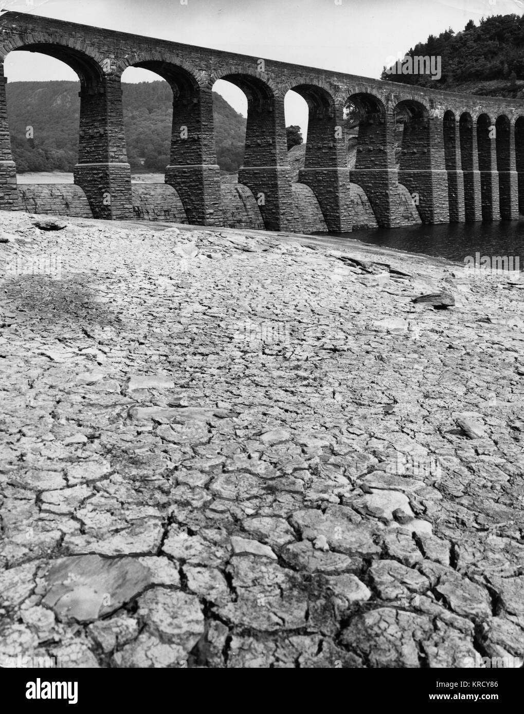 Garreg-ddu, one of the Elan Valley dams in Wales, dried out during the hot summer drought of 1976. Stock Photo