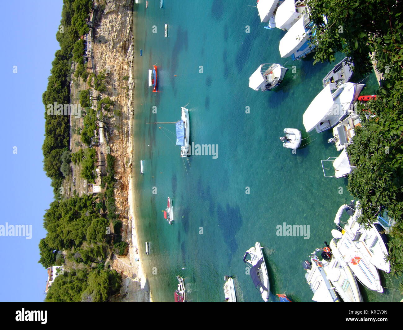 The small harbour of Votsi  with its beautiful turquoise  water.        Date: 2006 Stock Photo