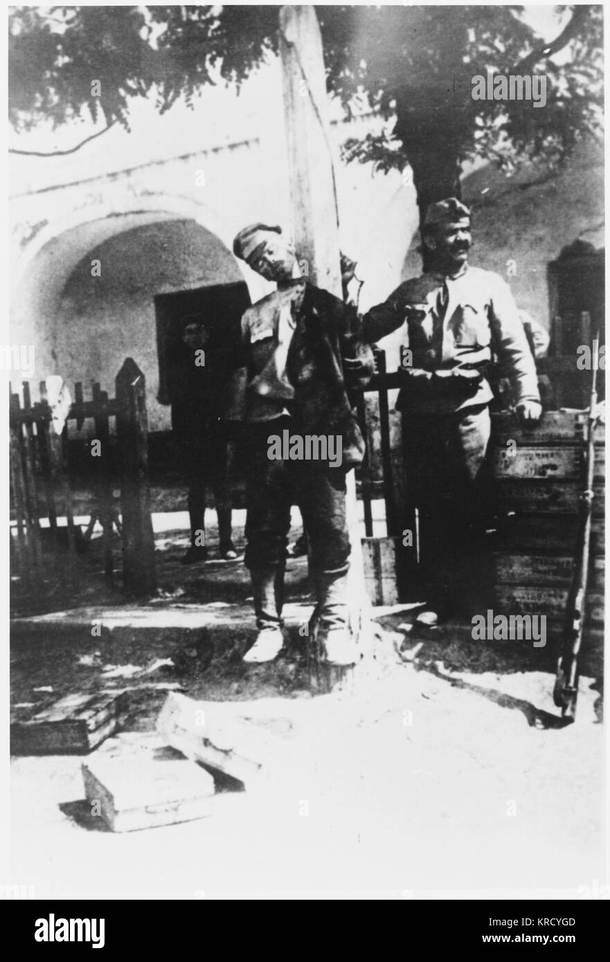 The occupying forces backing the 'White' Russians treat the  Bolsheviks with ruthless  severity  : captured partisan  leader Arsenti Pushkar is  hanged by the Austrians.      Date: 1918 Stock Photo