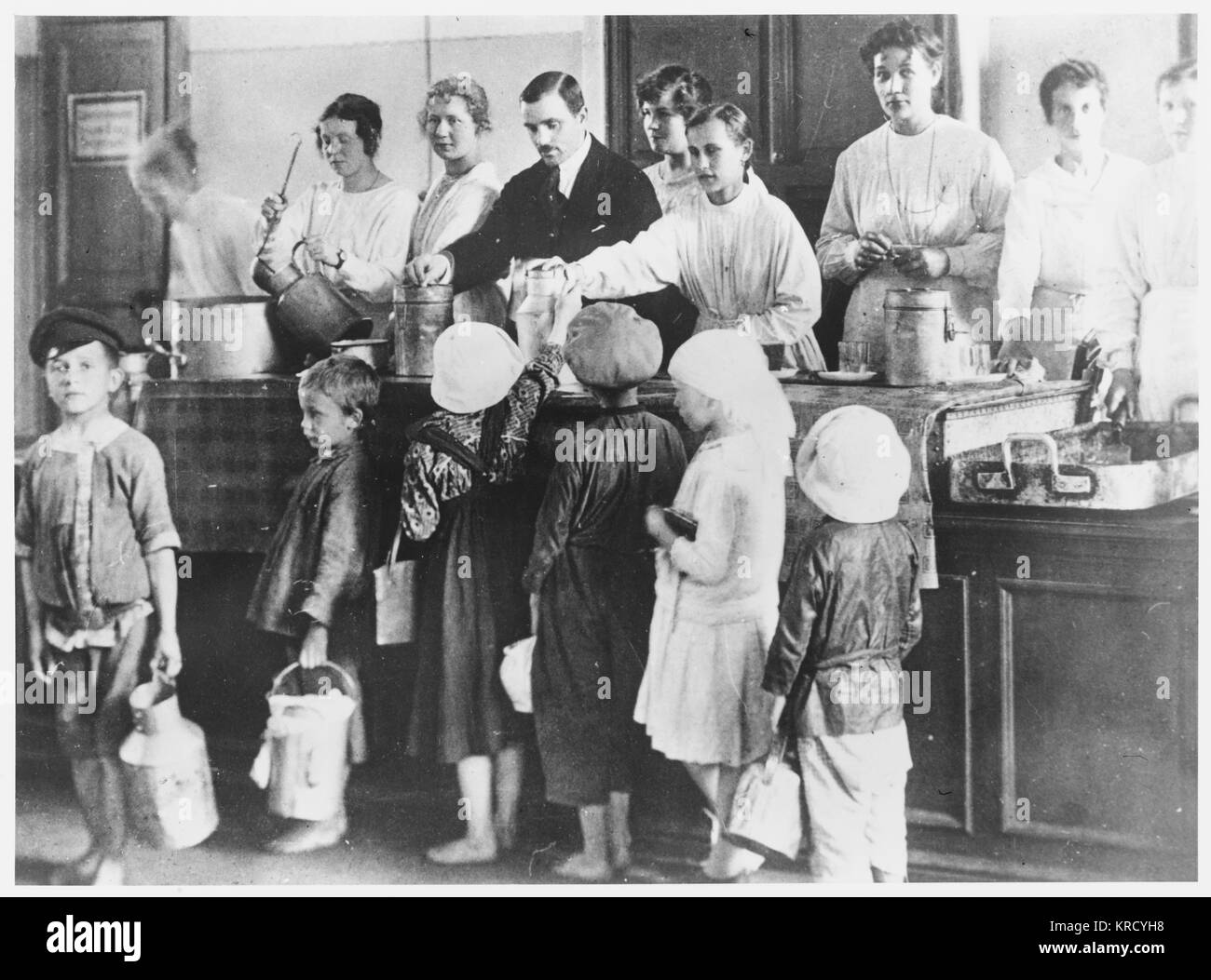 Homeless children of Petrograd  receive free dinners at a  canteen.        Date: 1920 Stock Photo