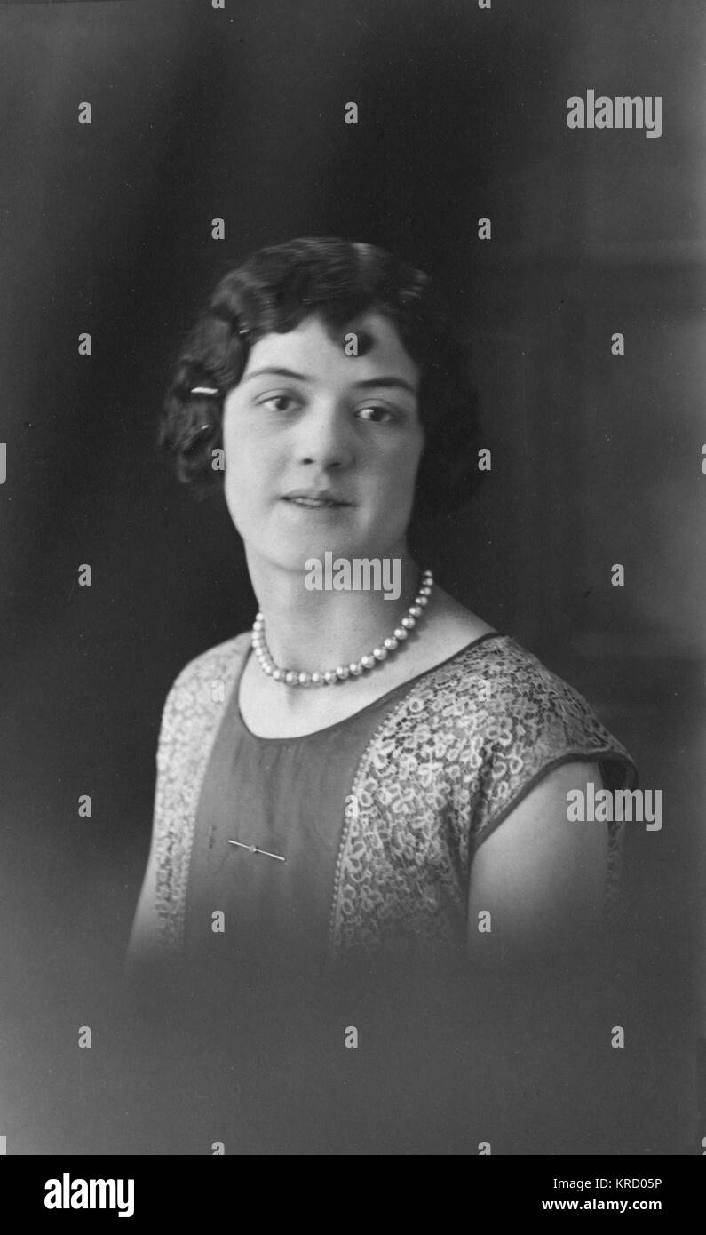 Young woman in head and shoulders portrait Stock Photo - Alamy