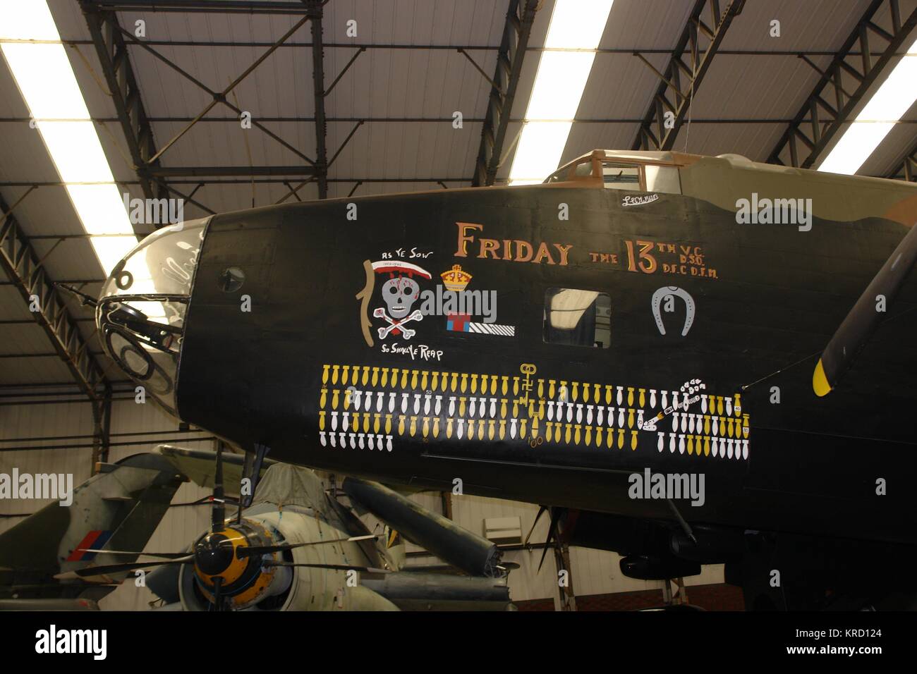 A Handley Page Halifax II fighter plane on display at the Elvington Air Museum near York.  It has 'Friday the 13th' and 'As ye sow, so shall ye reap' painted on the side, together with the number of bombs dropped on enemy territory.       Date: April 2009 Stock Photo