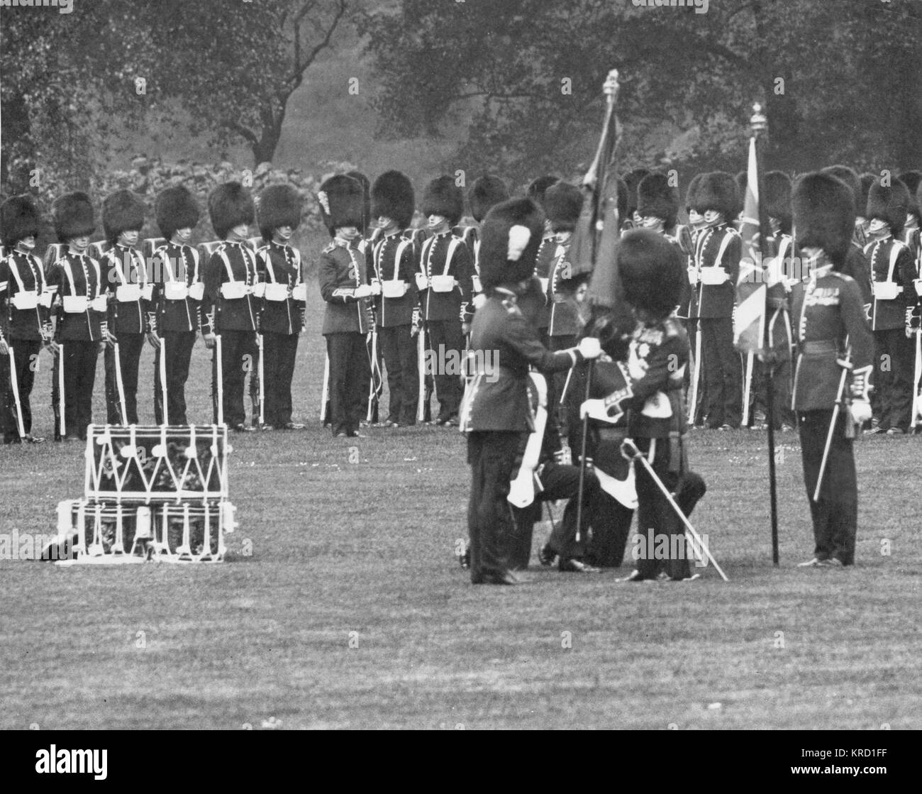 King George V presenting new colours to the Irish Guards at Buckingham ...