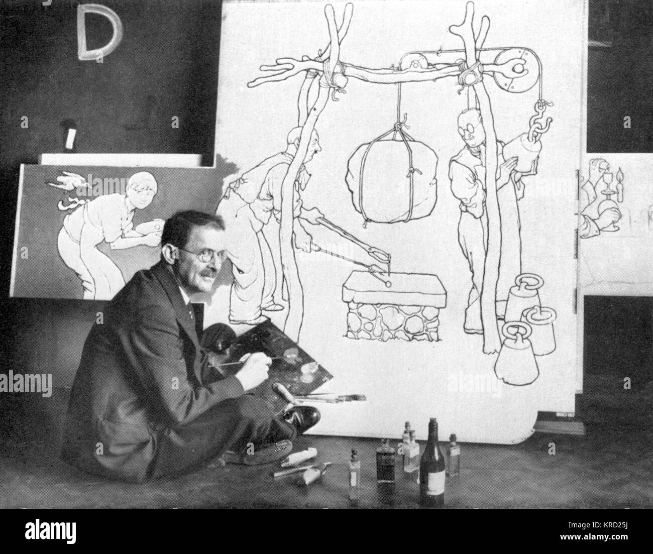 William Heath Robinson (1872 - 1944), artist and illustrator known as the 'Gadget King', pictured drawing for television in the 1940s.     Date: 1947 Stock Photo