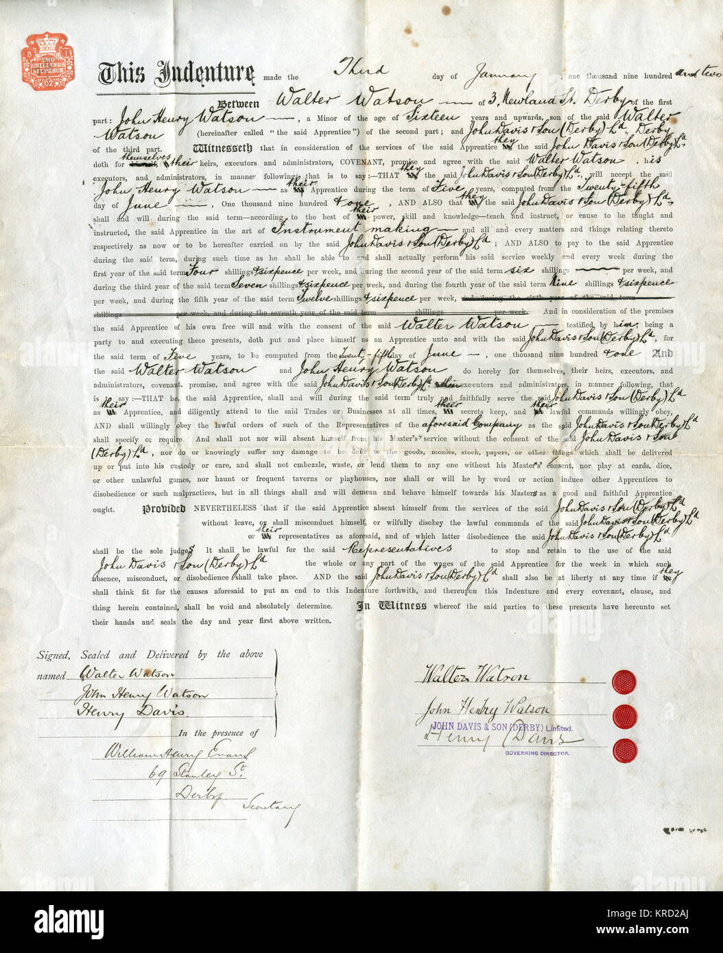 Official wording of an Apprenticeship Indenture, between John Henry Watson of 3 Newland Street, Derby, and Messrs John Davis &amp; Son (Derby) Limited.  The document is signed by John Henry Watson himself (then about 17 years old), his father Walter Watson, and Henry Davis, Governing Director.  The apprenticeship is for five years, dating from 25 June 1901, in the skill of instrument making.  The apprentice's pay is agreed at 4 shillings and sixpence per week for the first year, rising to 6 shillings in the second year, 7/6 in the third, 9/6 in the fourth, and 12/6 in the fifth.  The apprentic Stock Photo