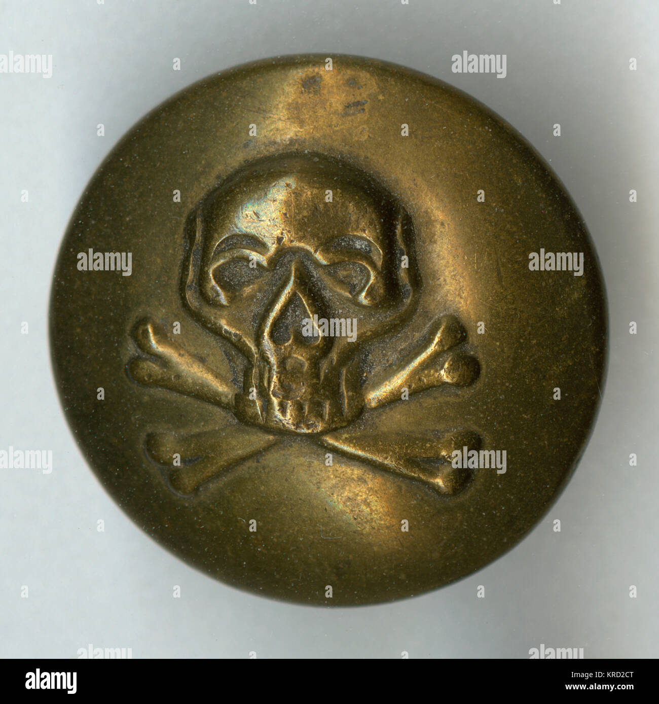 Skull and crossbones military button Stock Photo
