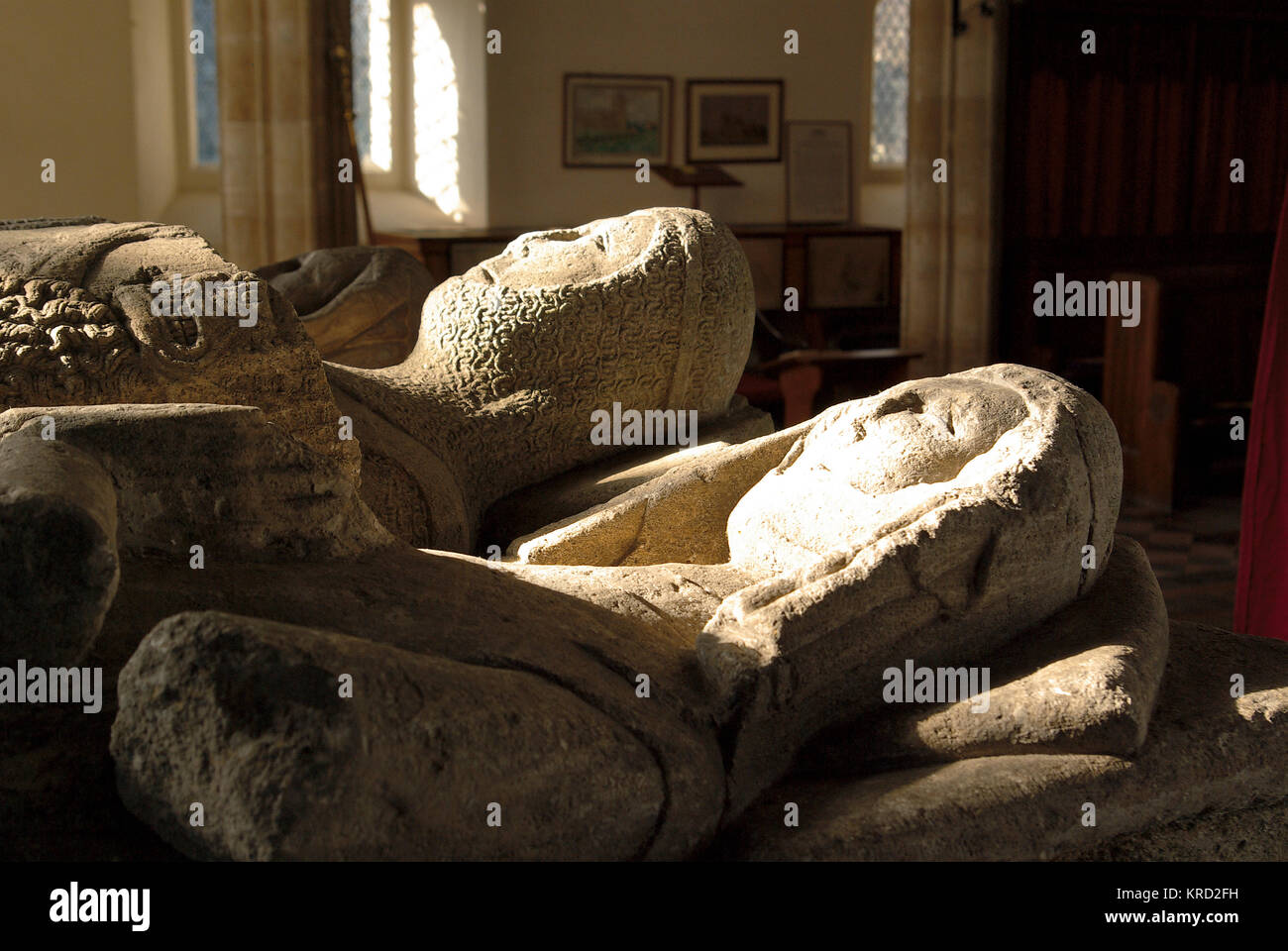 Effigies on a tomb in the church of St Michael the Archangel in the village of Laxton, Nottinghamshire.  The church dates back to the 12th century. Stock Photo