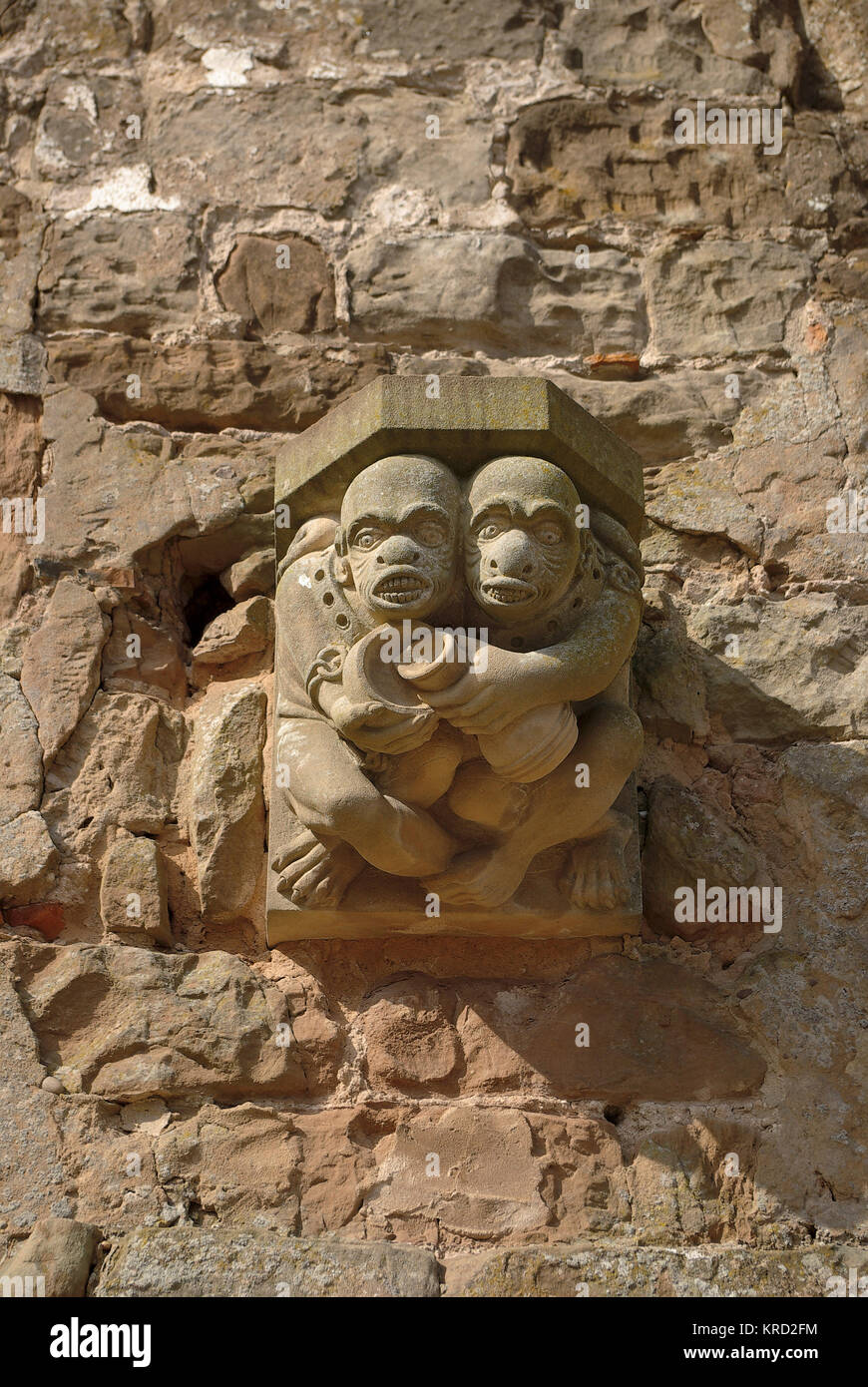 Close-up of gargoyles at Rufford Hall, Nottingham, showing two grotesque human figures huddled together.       Date: circa 2004 Stock Photo