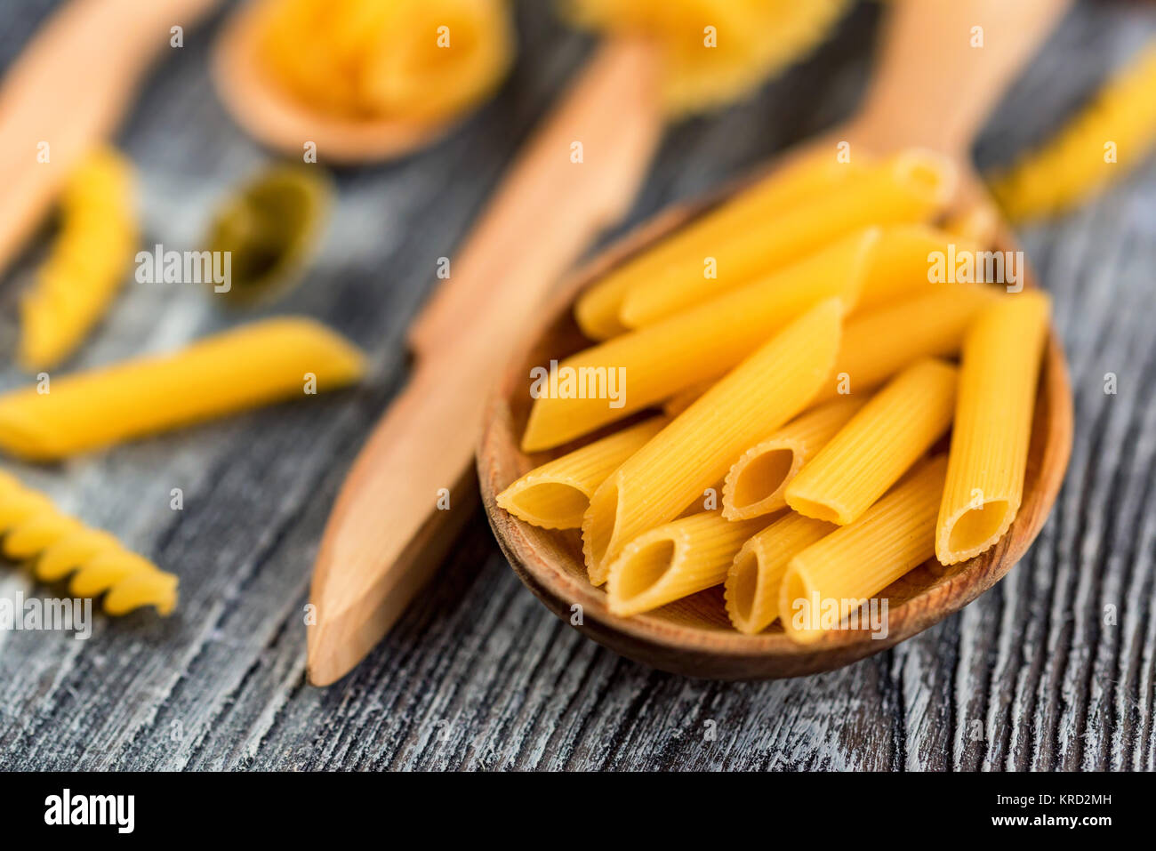 Various mix of pasta on wooden rustic background Stock Photo - Alamy