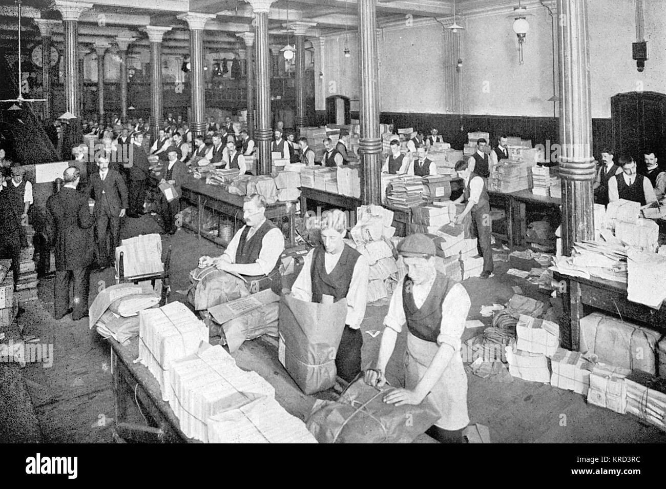 Sorting & packing newspapers overnight at W H Smith Stock Photo
