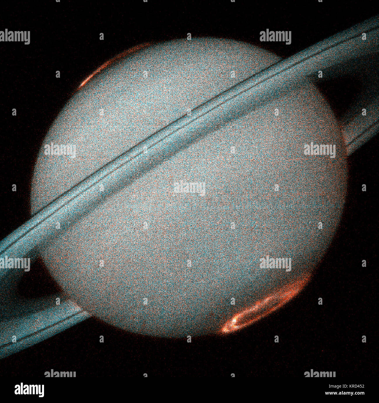 This is the first image of Saturn's ultraviolet aurora taken by the Space Telescope Imaging Spectrograph (STIS) on board the Hubble Space Telescope in October 1997, when Saturn was a distance of 810 million miles (1.3 billion kilometers) from Earth. The new instrument, used as a camera, provides more than ten times the sensitivity of previous Hubble instruments in the ultraviolet. STIS images reveal exquisite detail never before seen in the spectacular auroral curtains of light that encircle Saturn s north and south poles and rise more than a thousand miles above the cloud tops. Aurora Saturn Stock Photo