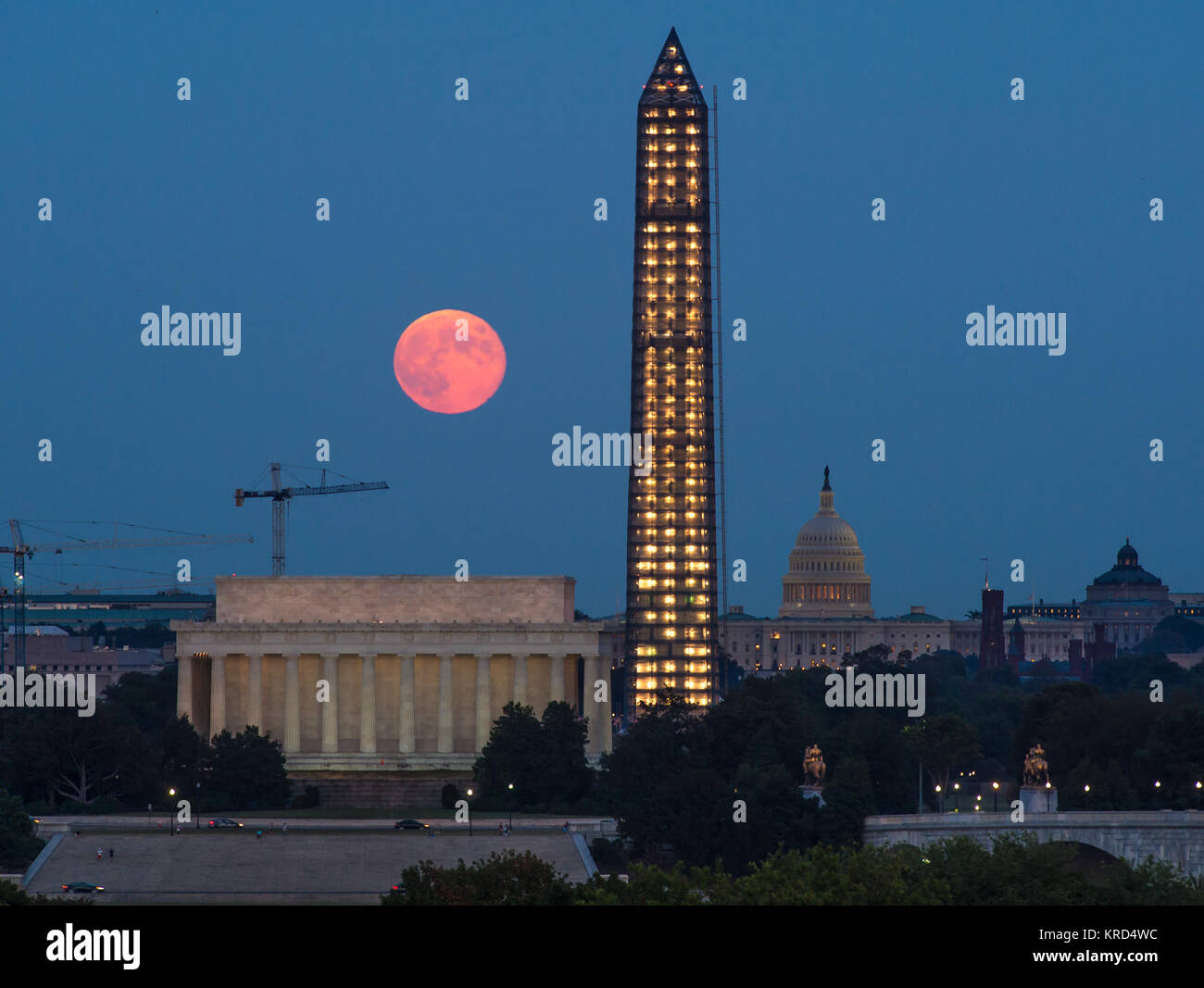 A full moon, known as a Harvest Moon, rises over Washington, Thursday, Sept. 19, 2013, in Washington. Photo Credit: (NASA/Bill Ingalls) Harvest Moon rises over Washington Stock Photo