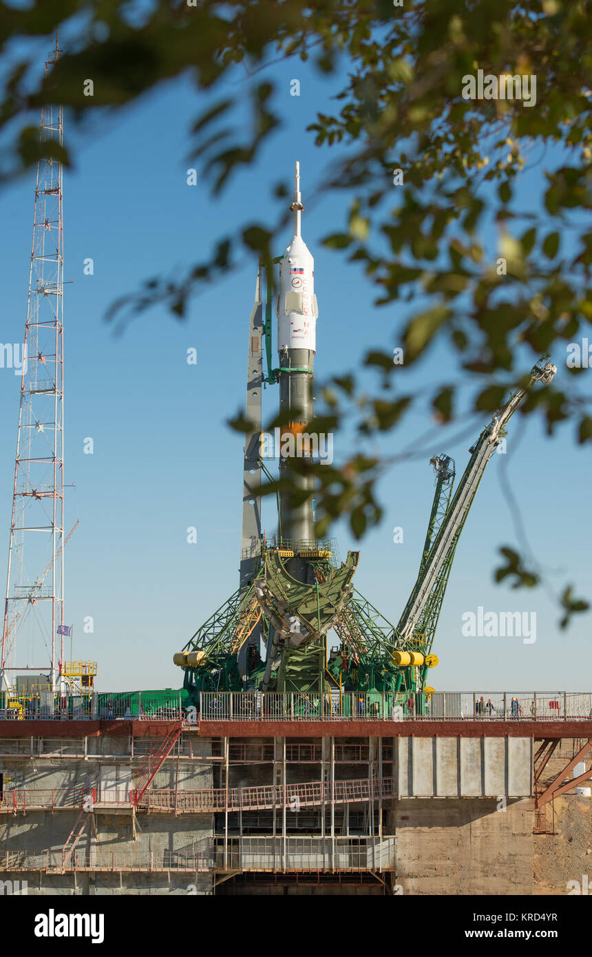 The Soyuz rocket is seen on its launch pad shortly after being lifted into its upright position on Monday, Sept. 23, 2013, at the Baikonur Cosmodrome in Kazakhstan. Launch of the Soyuz rocket is scheduled for September 26 and will send Expedition 37 Soyuz Commander Oleg Kotov, NASA Flight Engineer Michael Hopkins and Russian Flight Engineer Sergei Ryazansky on a five and a half-month mission aboard the International Space Station.  Photo Credit: (NASA/Carla Cioffi) Soyuz TMA-10M spacecraft at the Baikonur Cosmodrome launch pad (5) Stock Photo