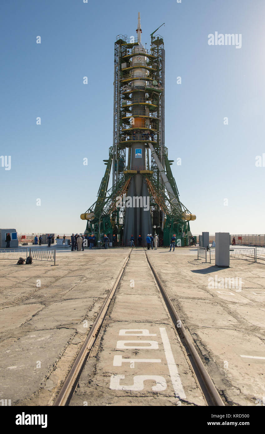 The Soyuz rocket is seen on its launch pad shortly after being lifted into its upright position on Monday, Sept. 23, 2013, at the Baikonur Cosmodrome in Kazakhstan. Launch of the Soyuz rocket is scheduled for September 26 and will send Expedition 37 Soyuz Commander Oleg Kotov, NASA Flight Engineer Michael Hopkins and Russian Flight Engineer Sergei Ryazansky on a five and a half-month mission aboard the International Space Station.  Photo Credit: (NASA/Carla Cioffi) Soyuz TMA-10M spacecraft at the Baikonur Cosmodrome launch pad (8) Stock Photo