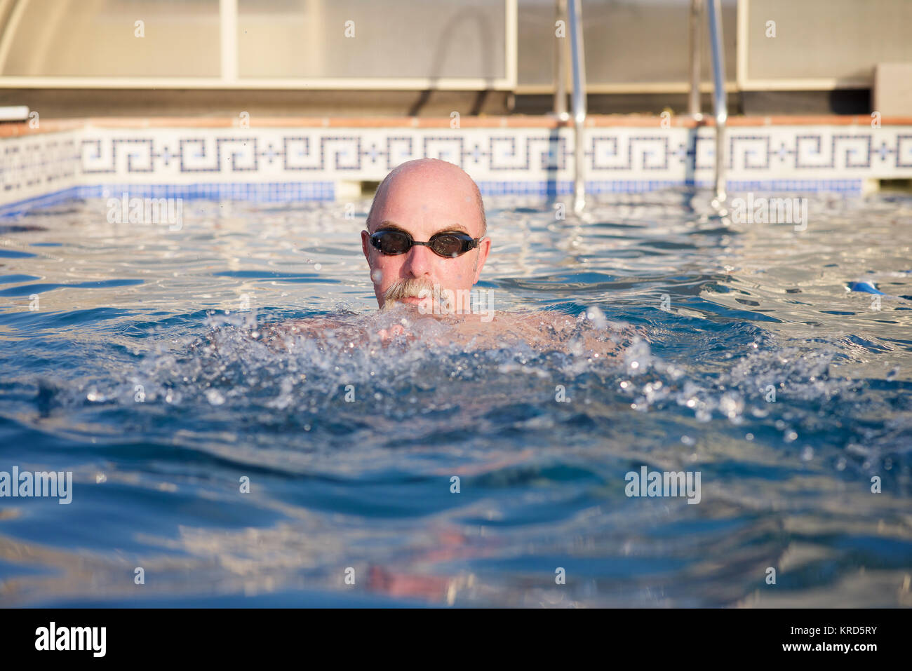 Male over 50 in a swimming pool Stock Photo
