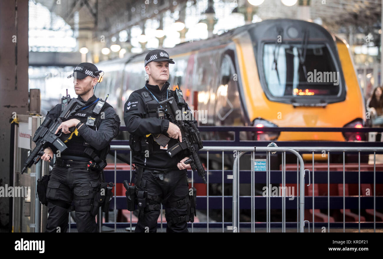 Armed British Transport Police officers on patrol in Manchester Piccadilly as the force announces that for the first time, it will have armed officers and specialist operations officers based outside of London. Stock Photo