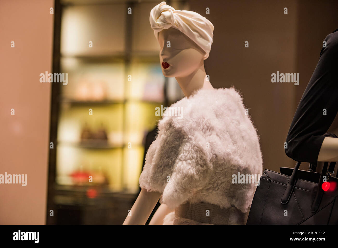 Clothing store concept mannequins in a display window Stock Photo Alamy