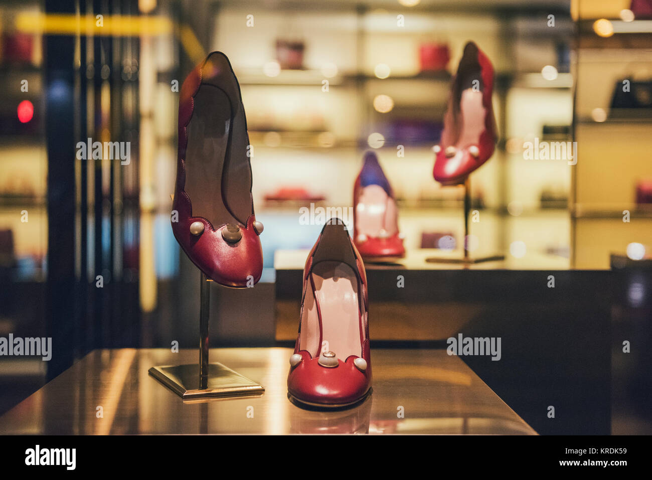 Women shoes in a luxury store with shop background Stock Photo - Alamy