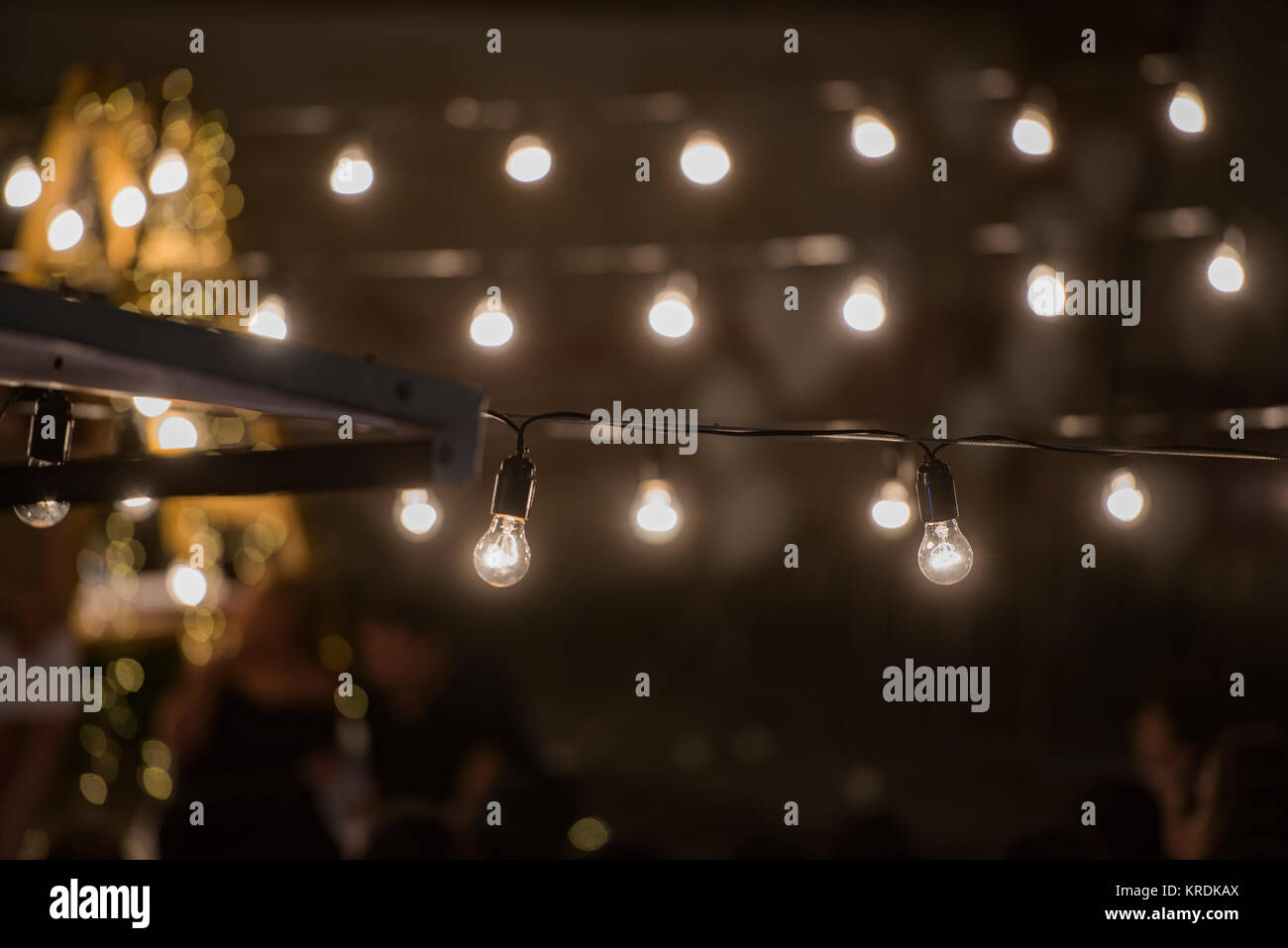 Light bulbs at night - summer party concept Stock Photo