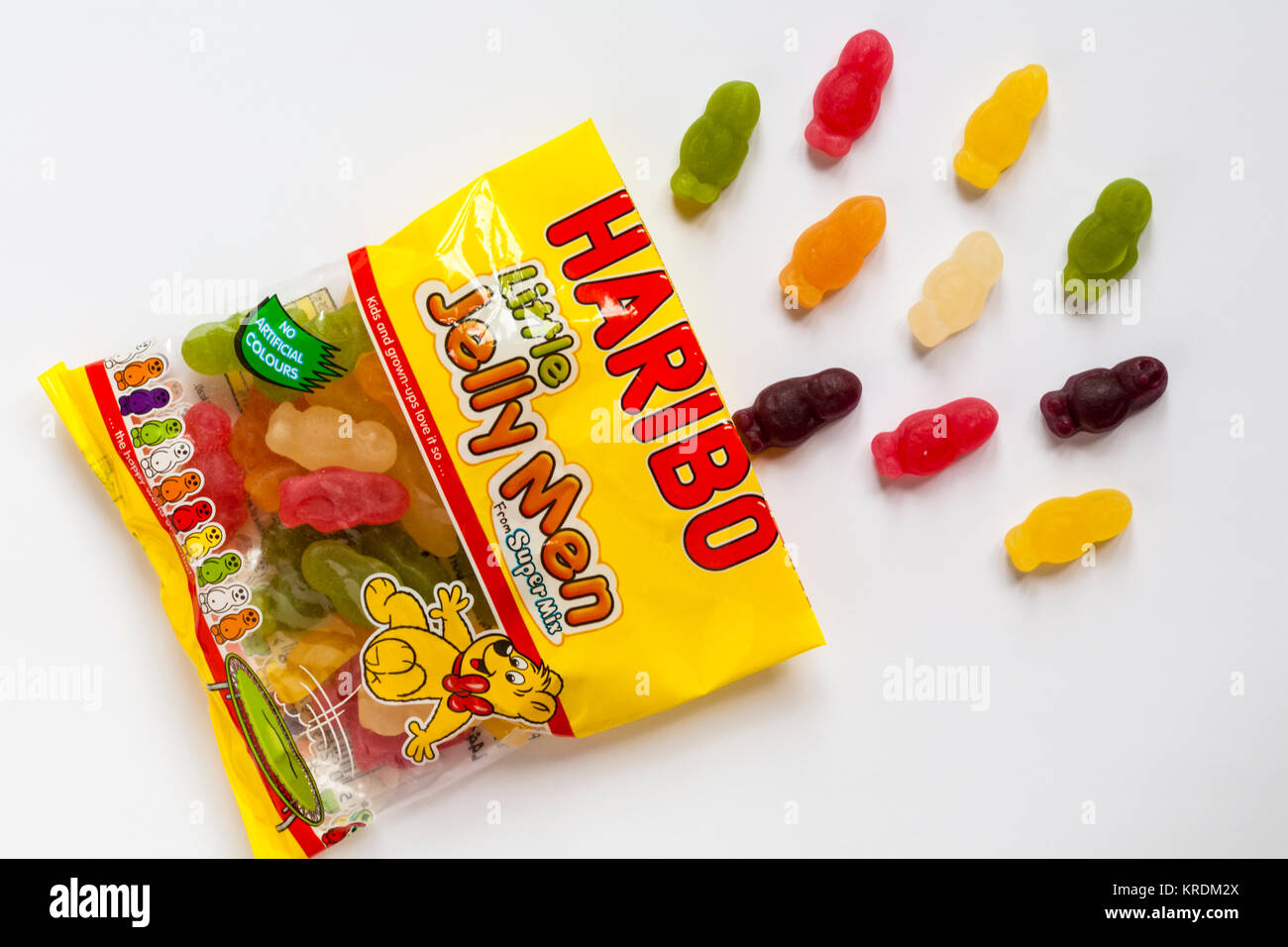 Packet of Haribo little Jelly Men from super mix sweets opened to show contents isolated on white background Stock Photo