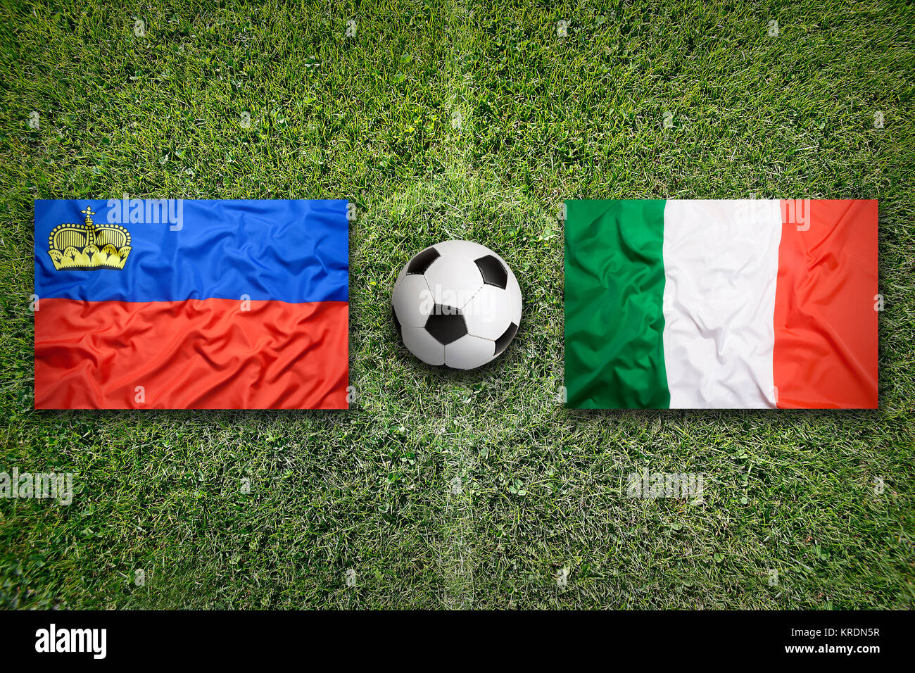 Liechtenstein vs. Italy flags on soccer field Stock Photo - Alamy
