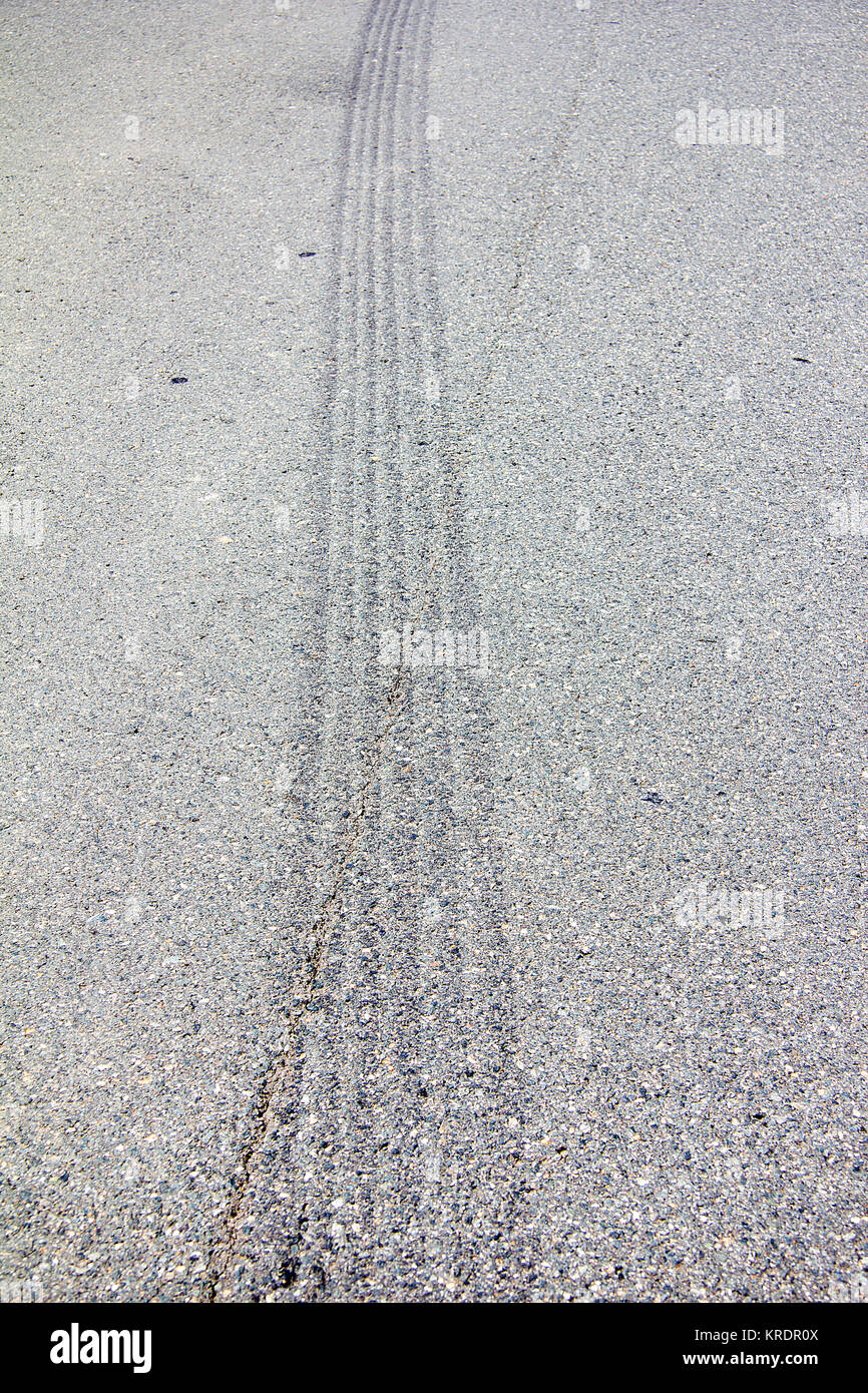 long tire marks on asphalt Stock Photo Alamy