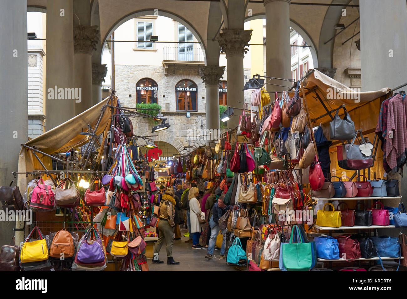 Florence, Italy, market selling leather goods with shoppers Stock ...