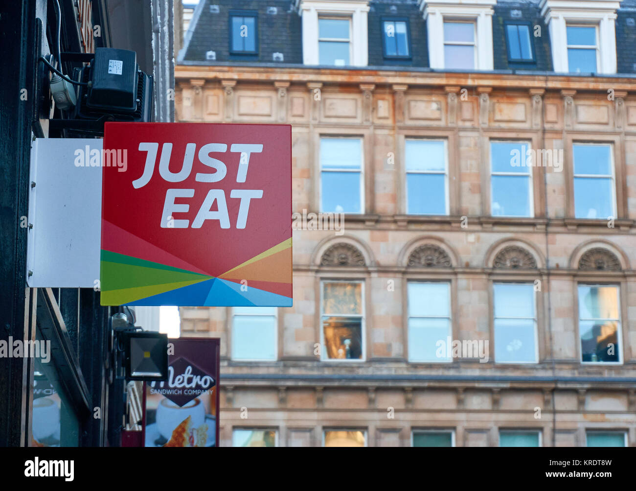 Logo of the Just Eat company, which provides a convenient fast food ordering experience. Stock Photo