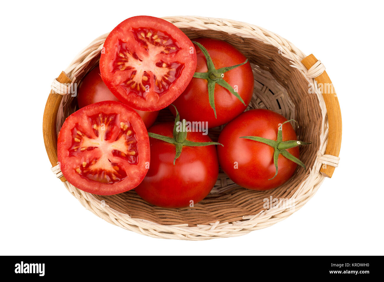 ripe tomatoes in a wicker basket isolated on white background Stock ...