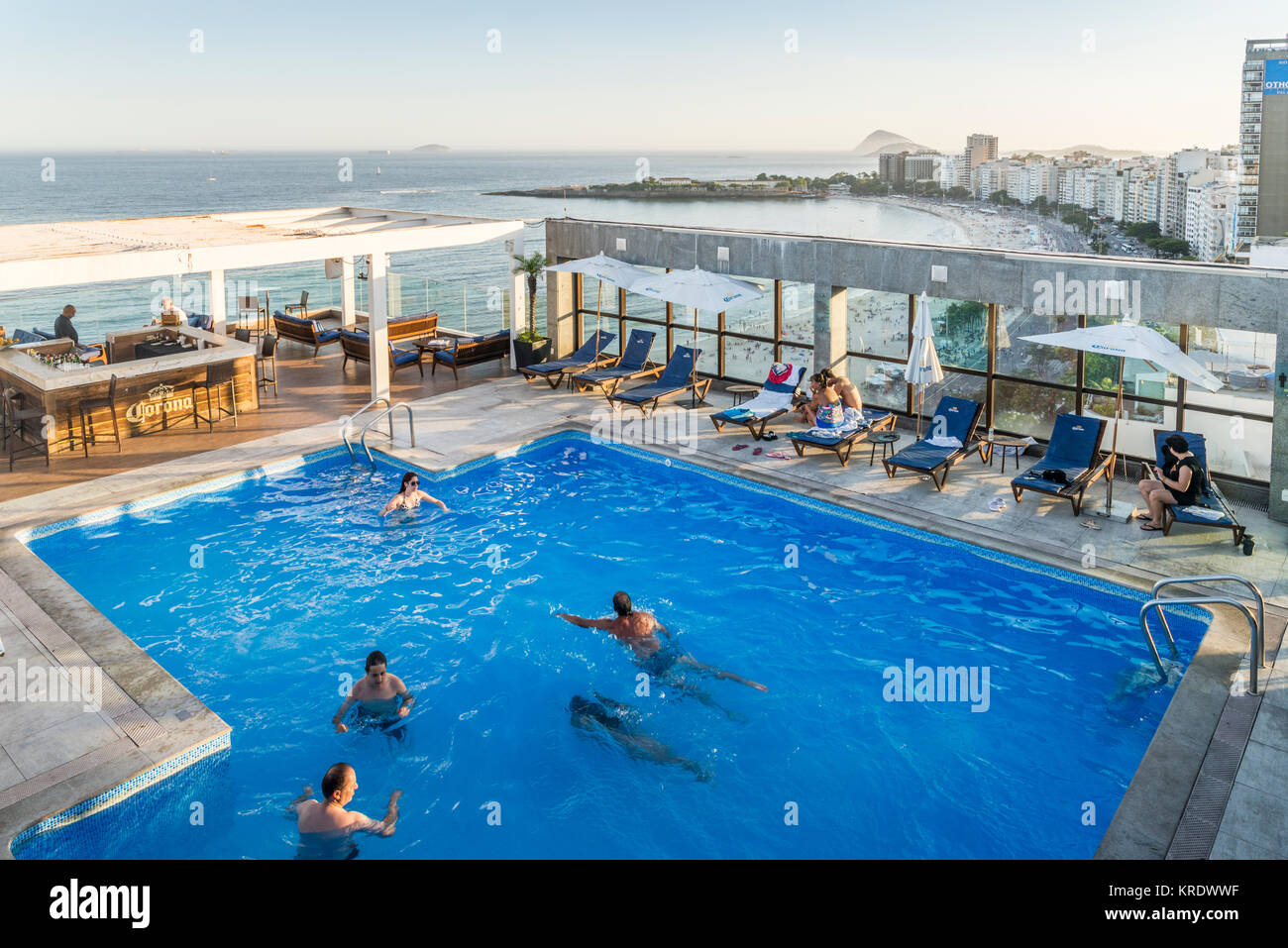 Picture of Rooftop view of swimmers at a luxurious hotel penthouse pool and bar ...