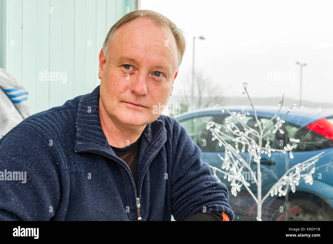 Stuntman Peter Dillon in a café in Schull, West Cork, Ireland. Stock Photo