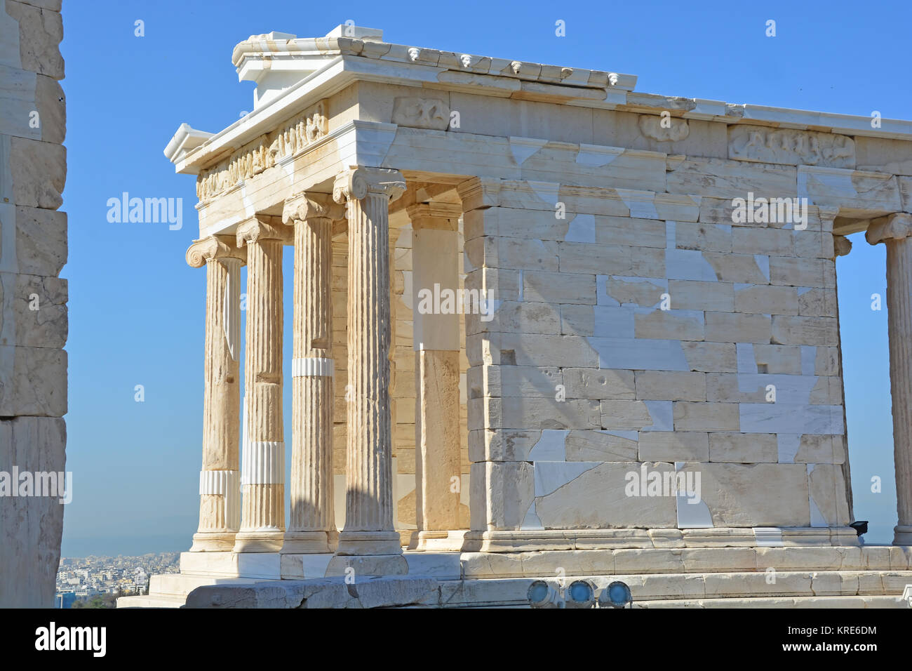 East entrance to the ancient greek temple of Athena Nike or victory on the  Acropolis of Athens Stock Photo - Alamy