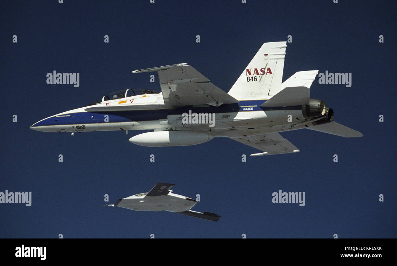 X-45A and NASA FA-18B during UCAV testing (EC04-0100-06) Stock Photo